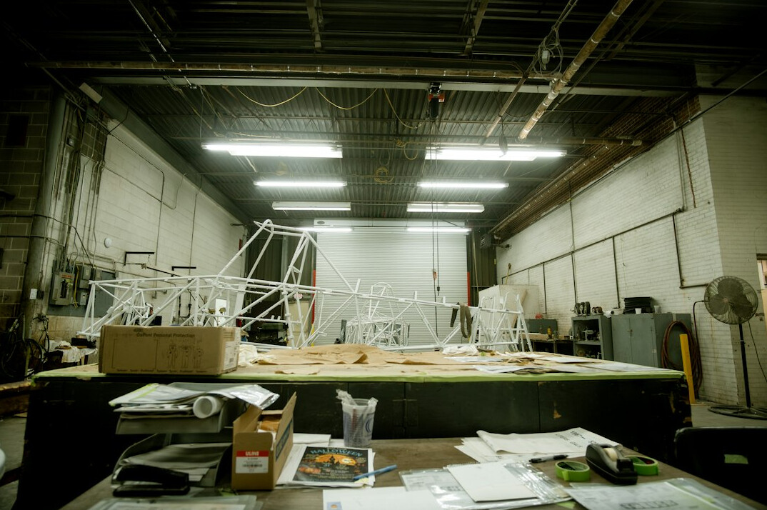 Production team in a planning meeting around a table
