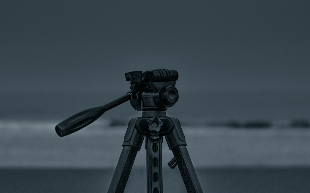 Professional broadcast video camera on a tripod in a studio